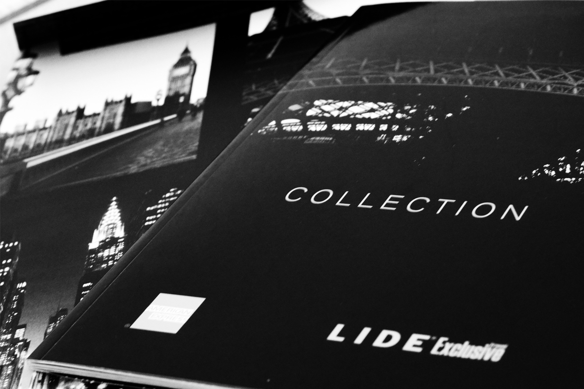 Catálogo Collection do LIDE Exclusive Travel, com capa preta e fotografia de cidade a preto e branco